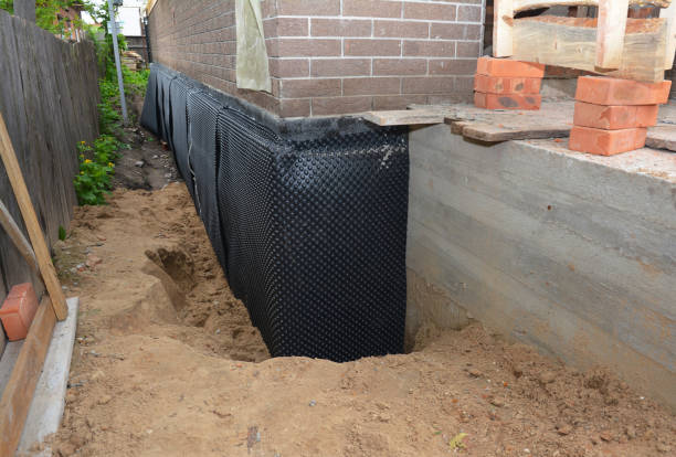 SJ Waterproofing Pros technician performing targeted Waterproofing assessment in New Weston, OH